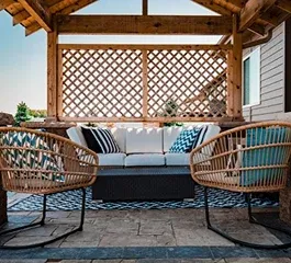 Cozy outdoor seating area with a white sofa