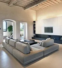 Modern living room featuring a large gray sectional sofa