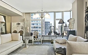 Modern living room featuring beige sofas