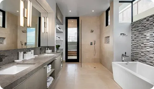 Modern, spacious bathroom featuring a sleek double vanity