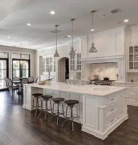 Modern white kitchen with marble island