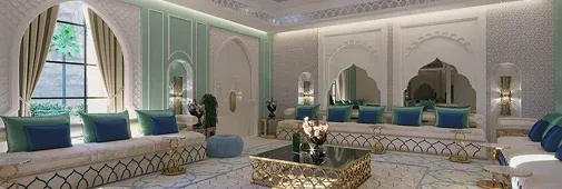 Spacious, elegantly designed living room featuring ornate decor plush sofas